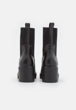 Bottines À Plateau - Black -Even-Odd Magasin 8e3b54392506437c833dfb0225925809