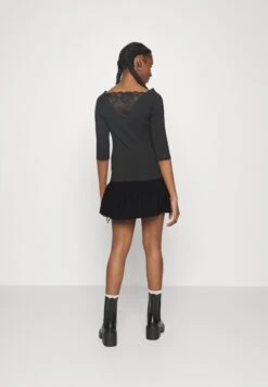 Minijupe - Black -Even-Odd Magasin 9043d4effb274ac89cca7d99c4902d9f